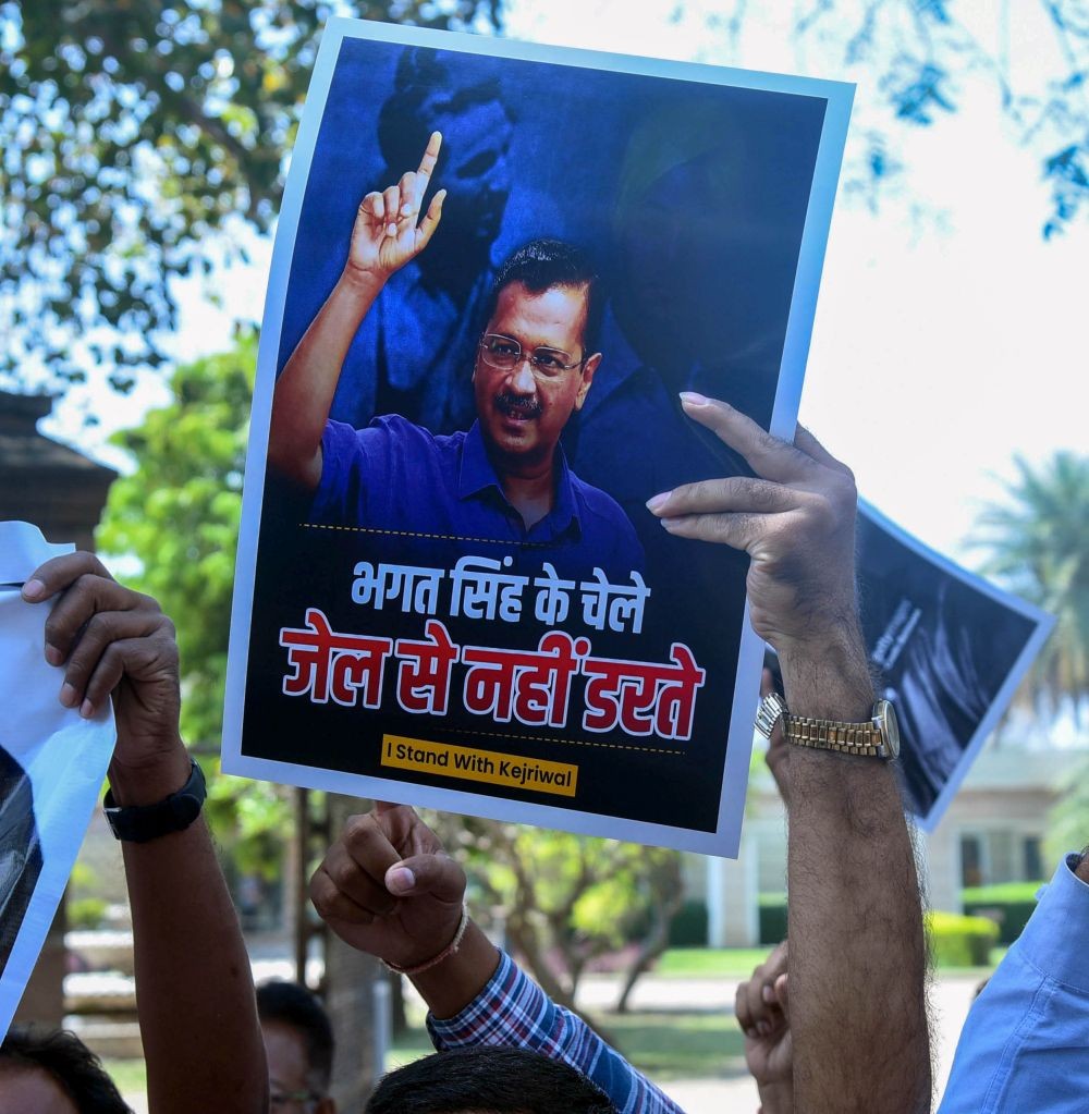 Nagpur : A supporter of Aam Aadmi Party holds placard during a protest against the arrest of Chief Minister Arvind Kejriwal by the Enforcement Directorate (ED), in Nagpur on Friday, March 22, 2024. (Photo: IANS/Chandrakant Paddhane)